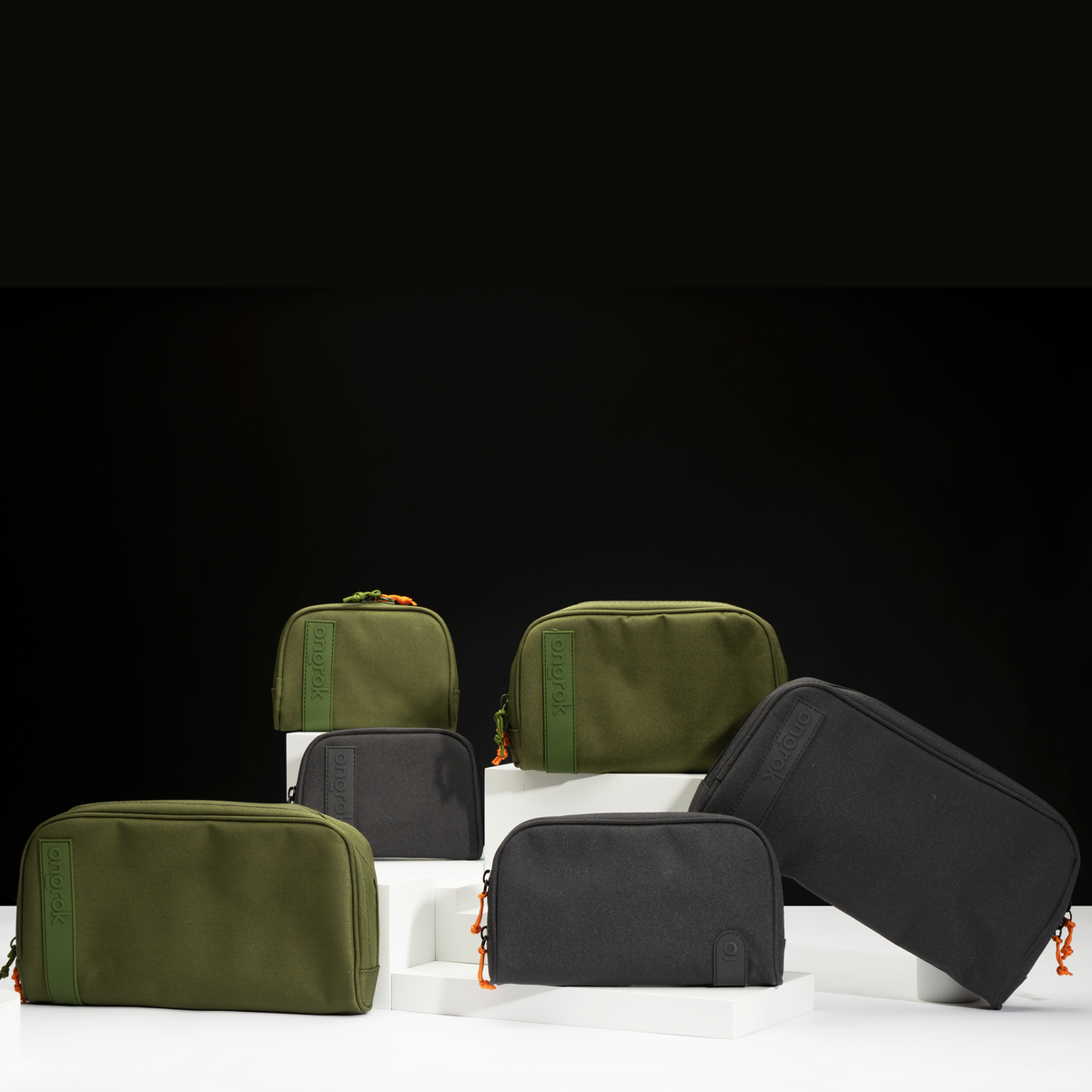 ONGROK Carbon-lined Wallets in green and black, small, medium and large, on white blocks